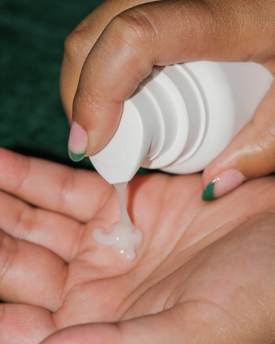 Close up of Micro-Exfoliating Cleanser on skin.