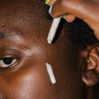 Close up of Galilee Antioxidant Dewy Drop on skin.