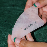 Close up of the Crystal Contour Gua Sha in Rose.