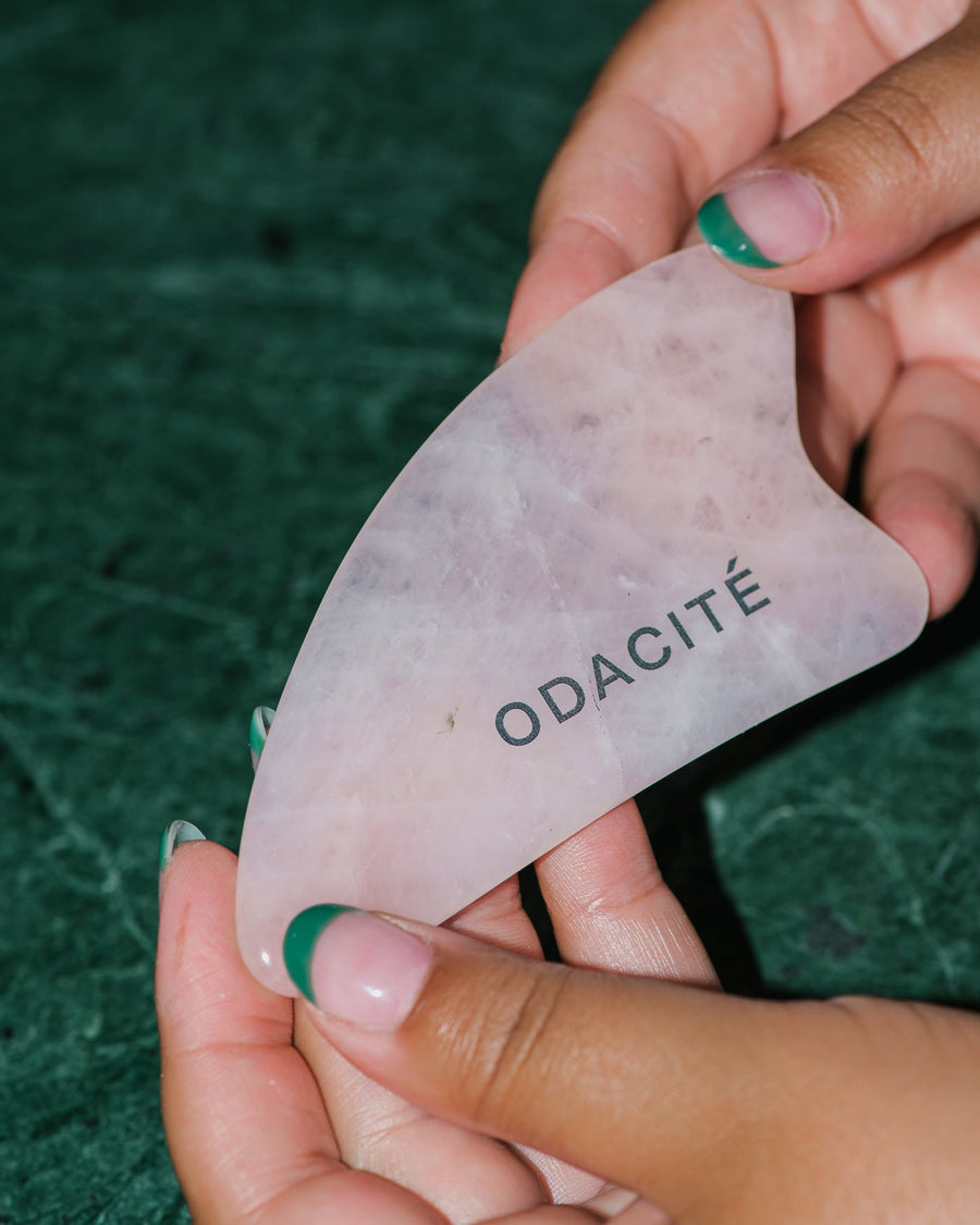 Close up of the Crystal Contour Gua Sha in Rose.