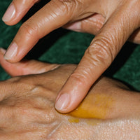 Close up of All-Embracing Serum on hand.