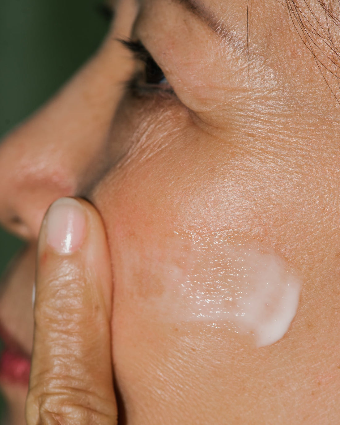 Close up of Age-Reversing Concentrate on skin.